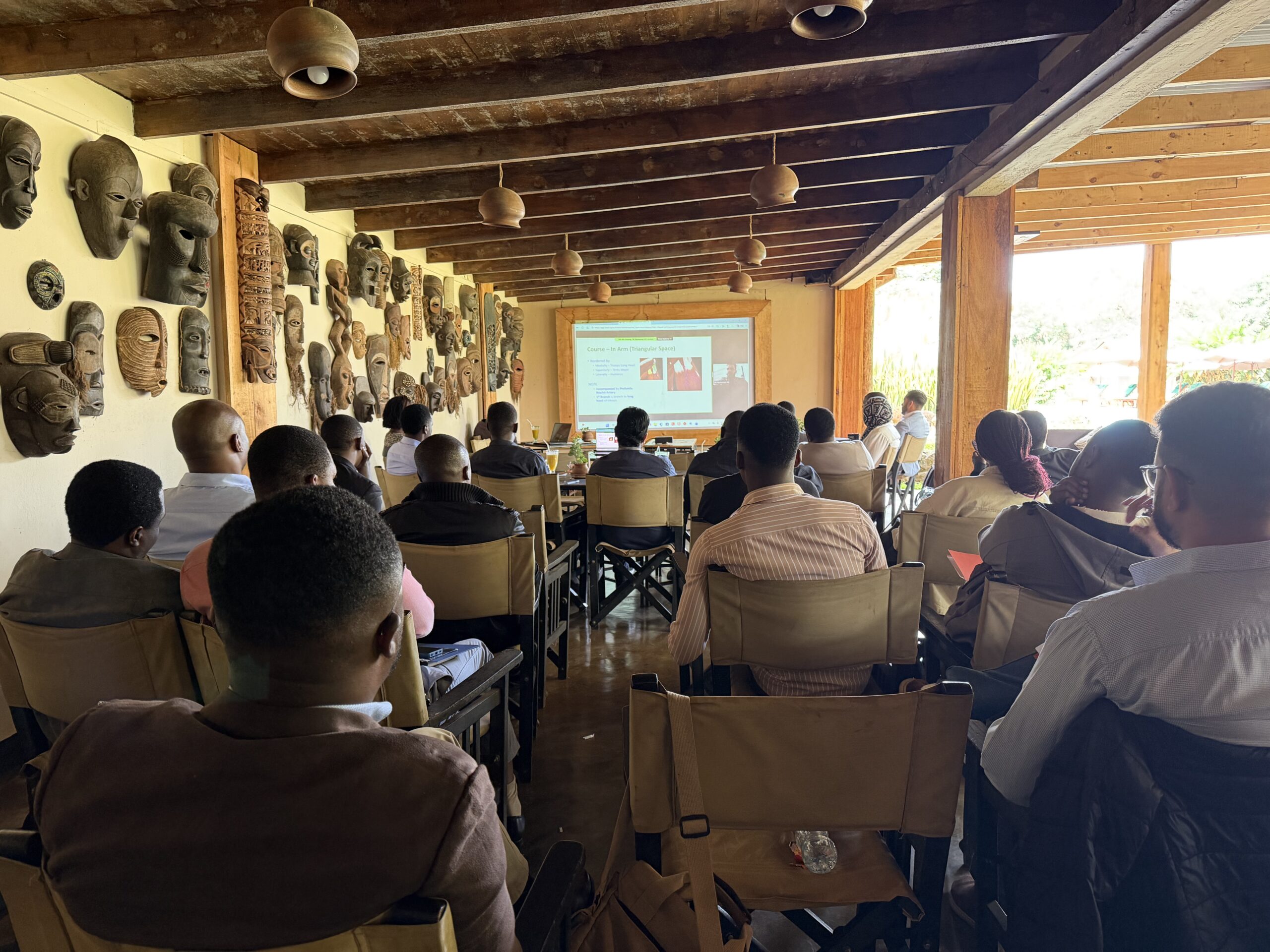 Surgeons and providers attending a Handzania lecture